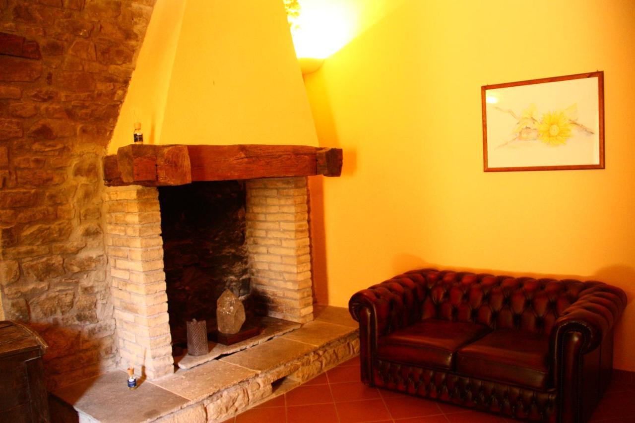 אסיסי Agriturismo Le Case מראה חיצוני תמונה